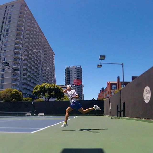 Giacomo Balli playing tennis at the Bay Club in San Francisco.